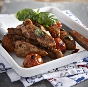 Juicy chicken with cherry tomatoes and basil