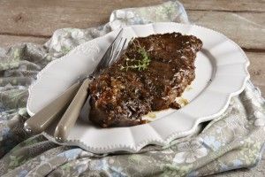 Beef steak with grape syrup dark beer and mustard seeds