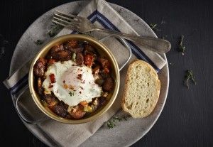 Delicious saganaki with sausage, anthotyro and egg