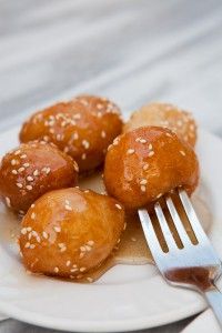 Loukoumades (Greek doughnuts) with honey and sesame