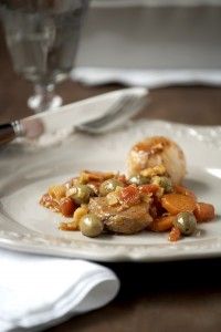 Beef pot roast with carrots and green olives