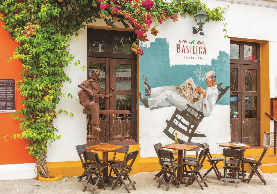 Picturesque facade of Pizza place at Plaza del Pozo, Well Plaza,