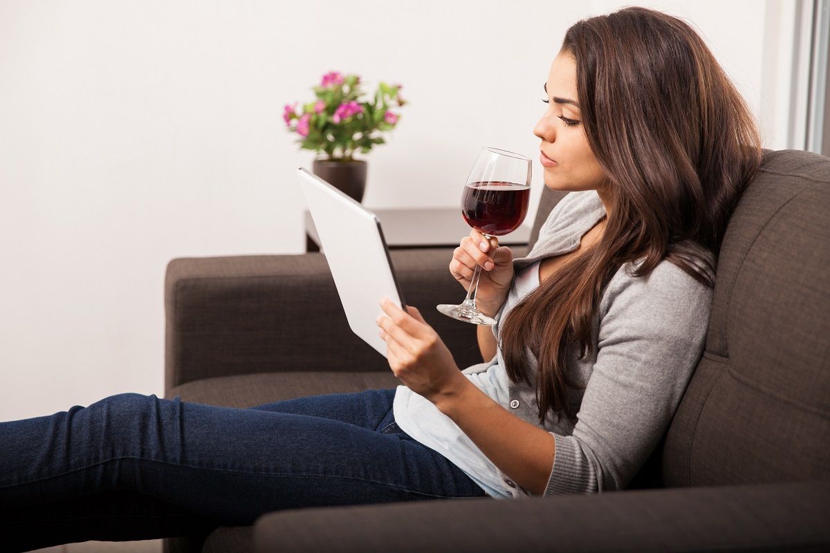 Taking a sip of wine