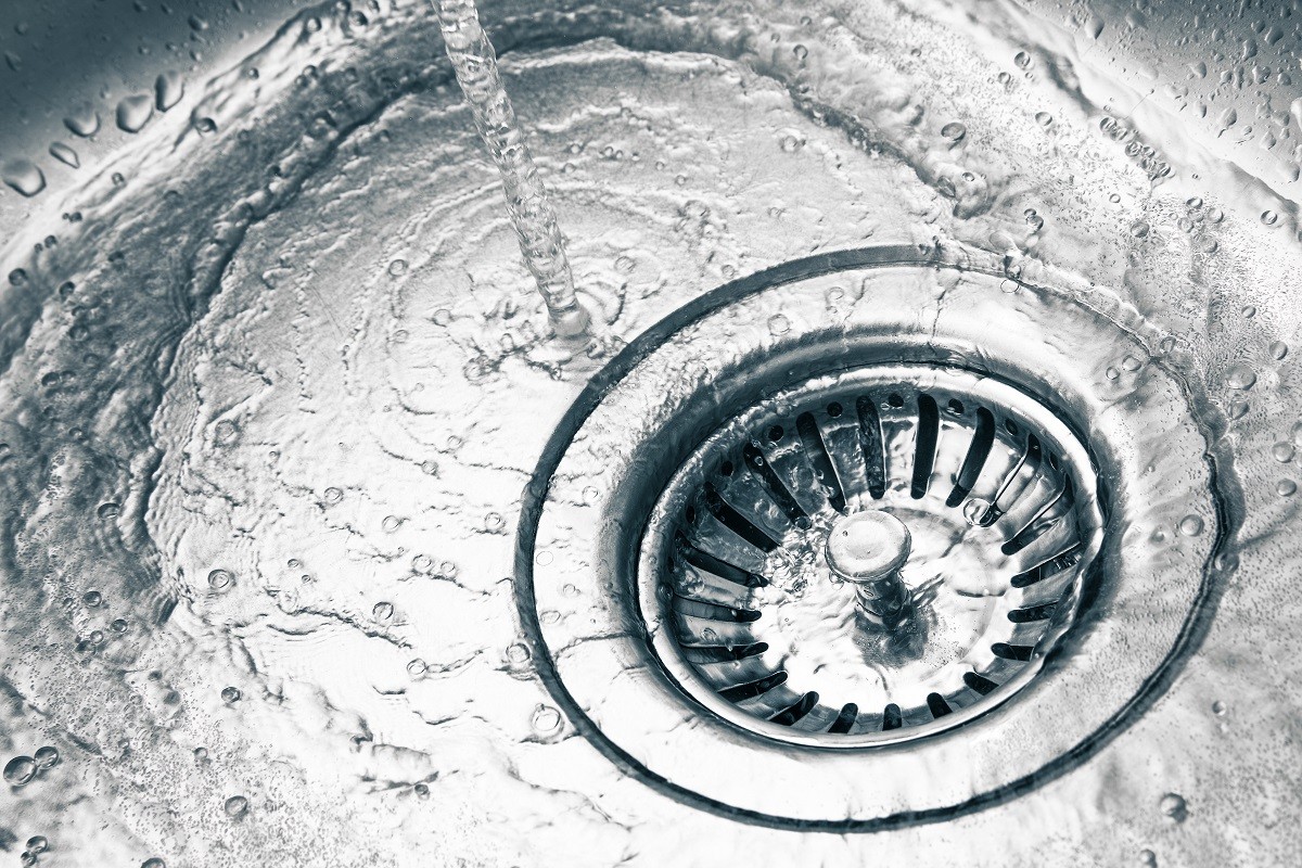 a stainless steel kitchen sink drain