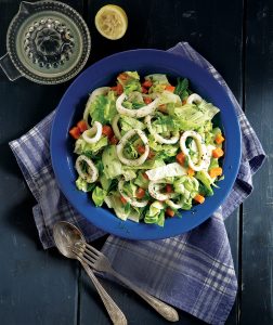 Green salad with marinated squid