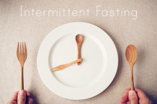 white plate with spoon and fork, Intermittent fasting concept, k