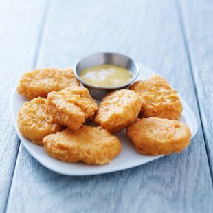 chicken nuggets with honey mustard in natural light