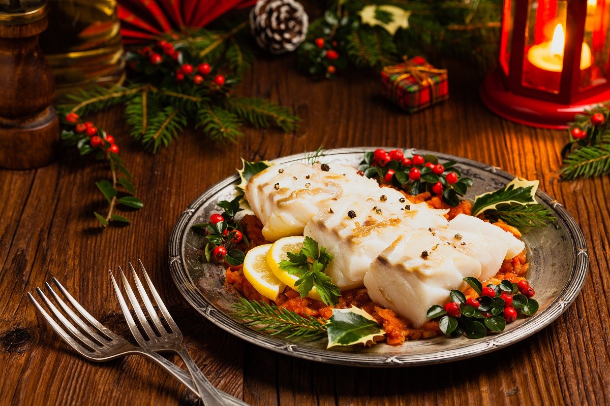 Christmas fish. Roasted cod pieces, served in vegetable sauce.