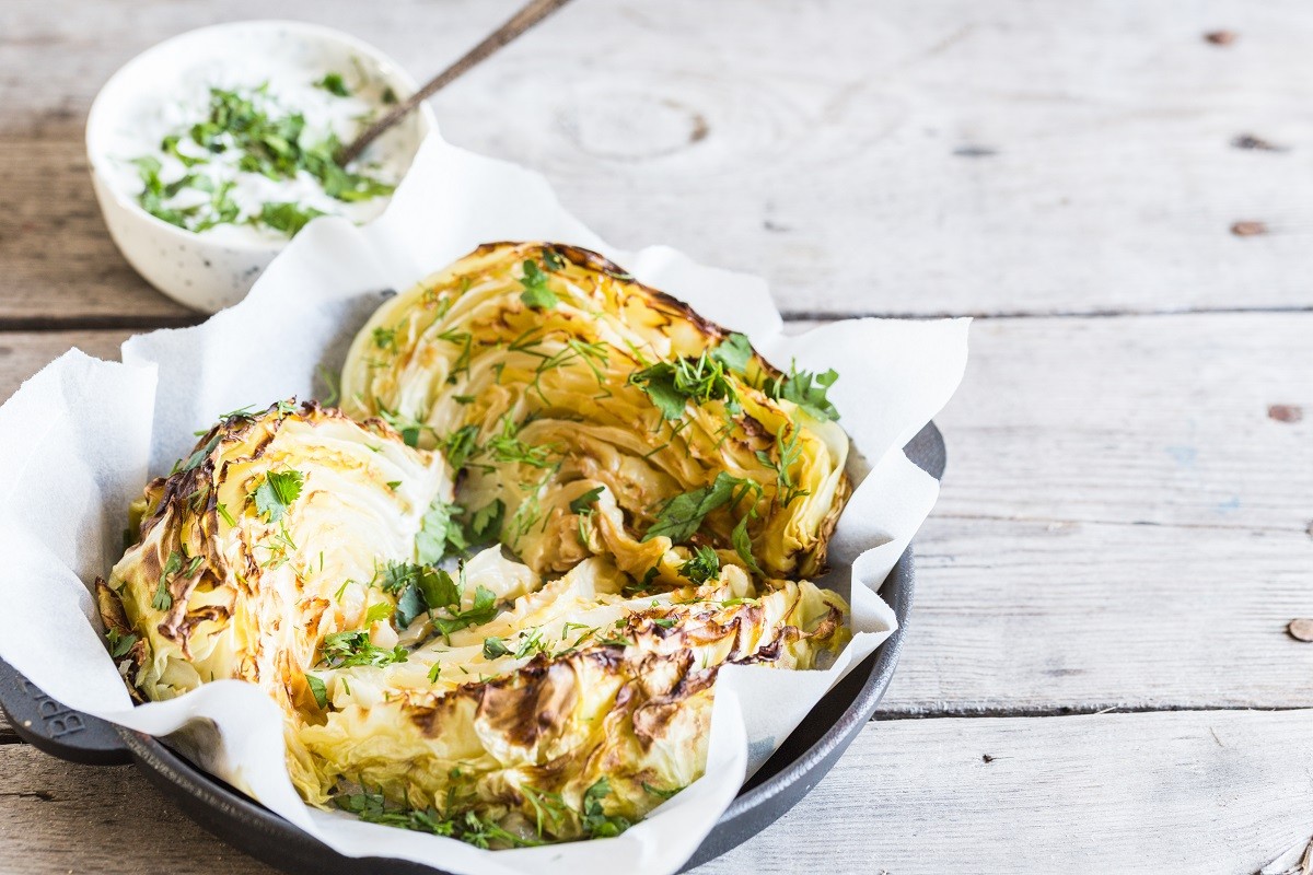 Baked cabbage slices. Vegan diet. Healthy grilled cabbage steaks