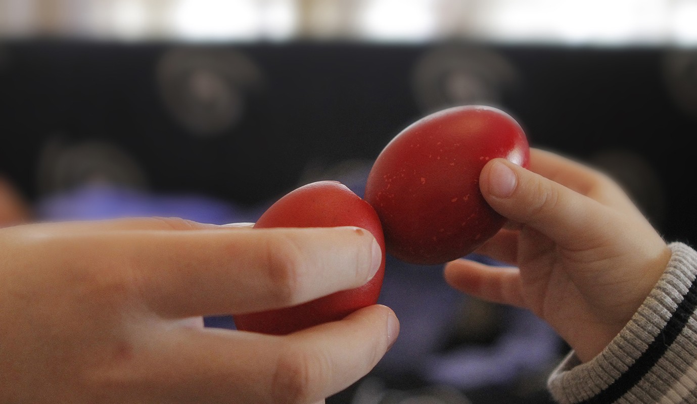 Cracking eggs Easter