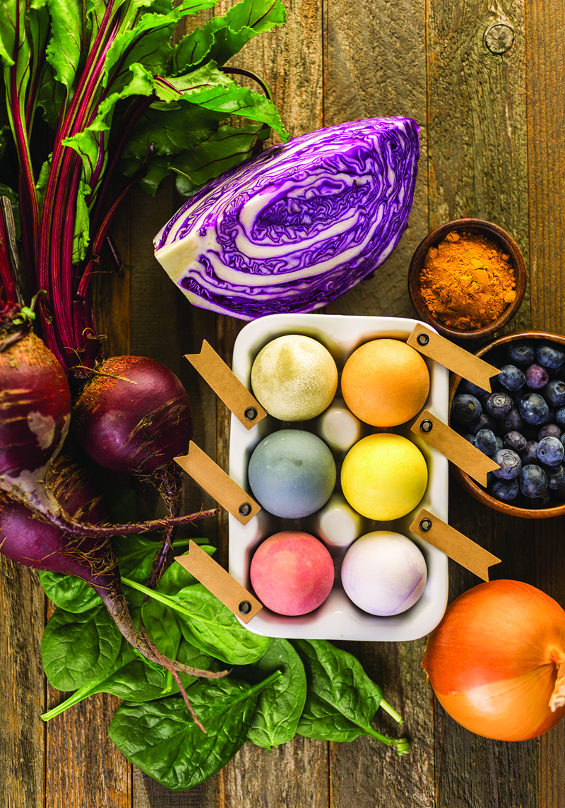 53667176 – easter eggs painted with natural egg dye from fruits and vegetables.