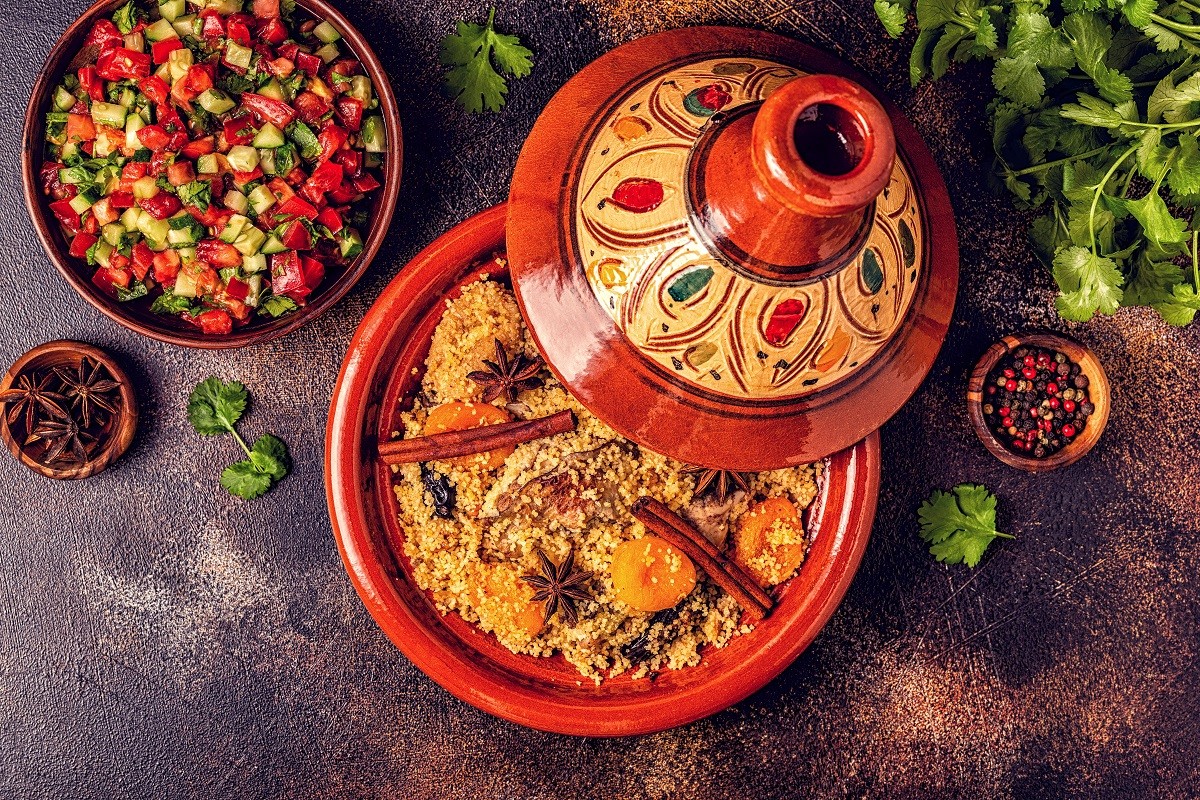 Traditional moroccan tajine of chicken with dried fruits and spi