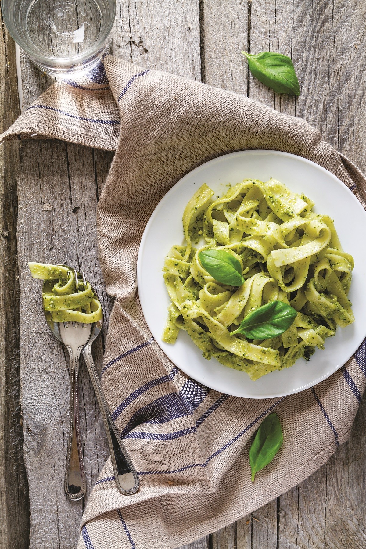 Pesto pasta on white plate