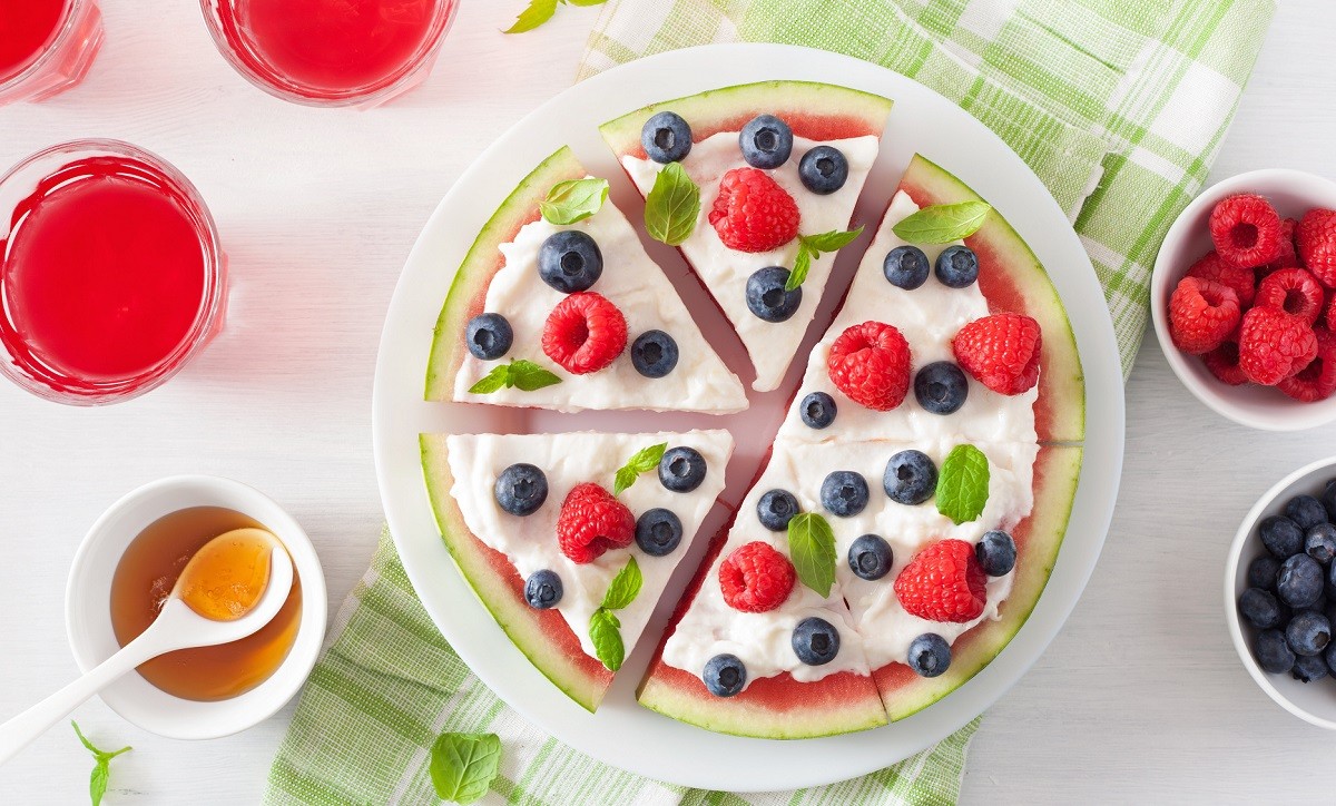 watermelon pizza slices with yogurt and berries, summer dessert