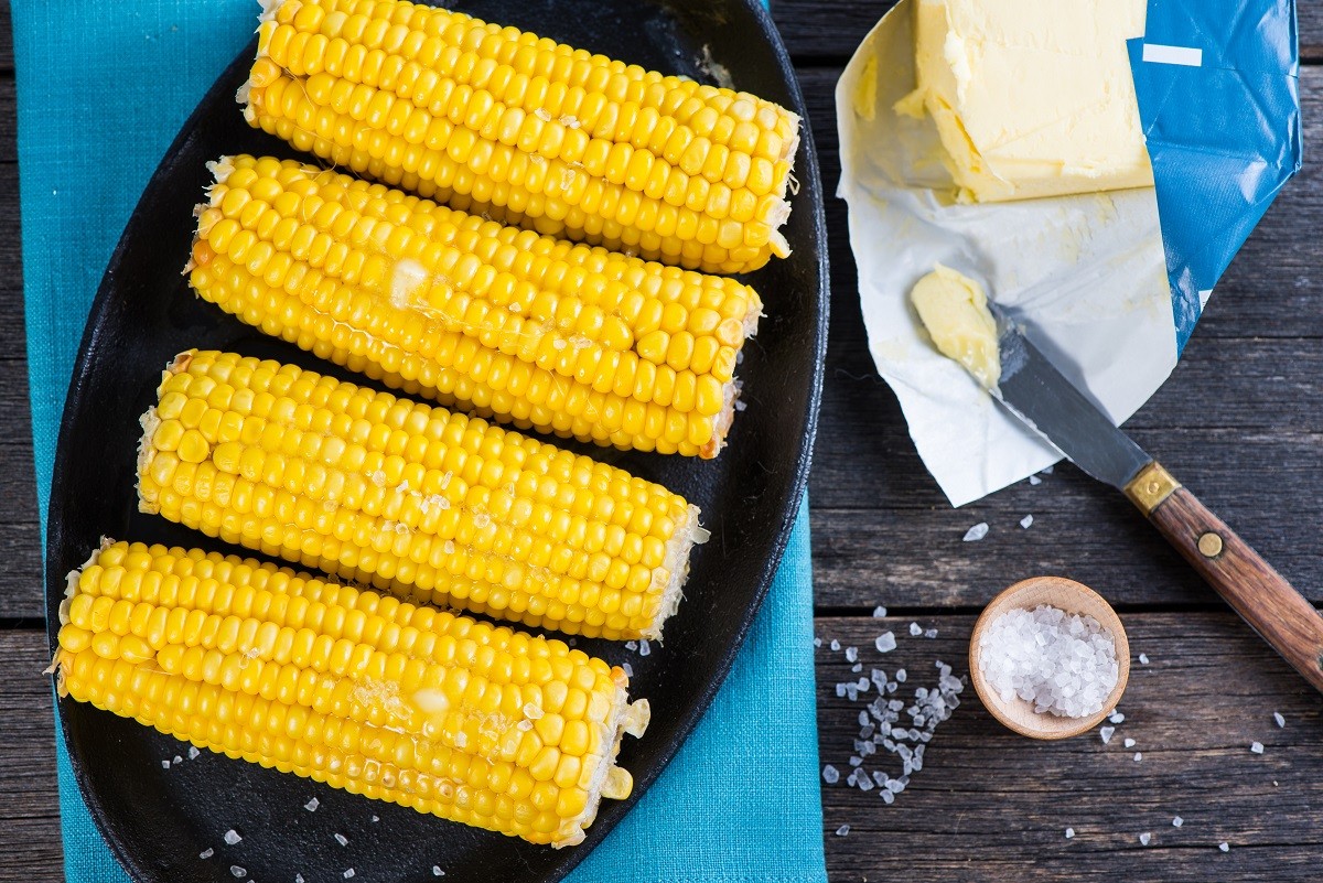 hot golden corn cob with butter and salt