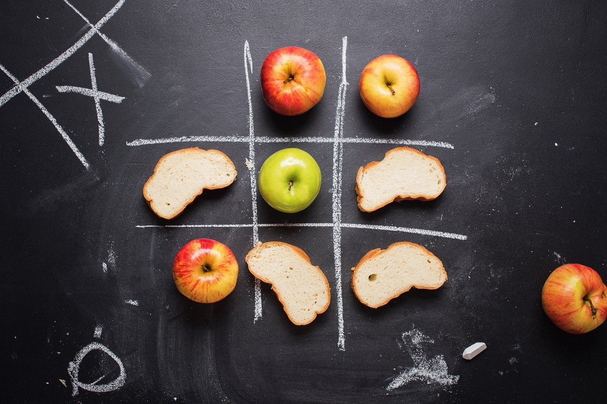 Tic-tac-toe Game Between Useful Harmful Product