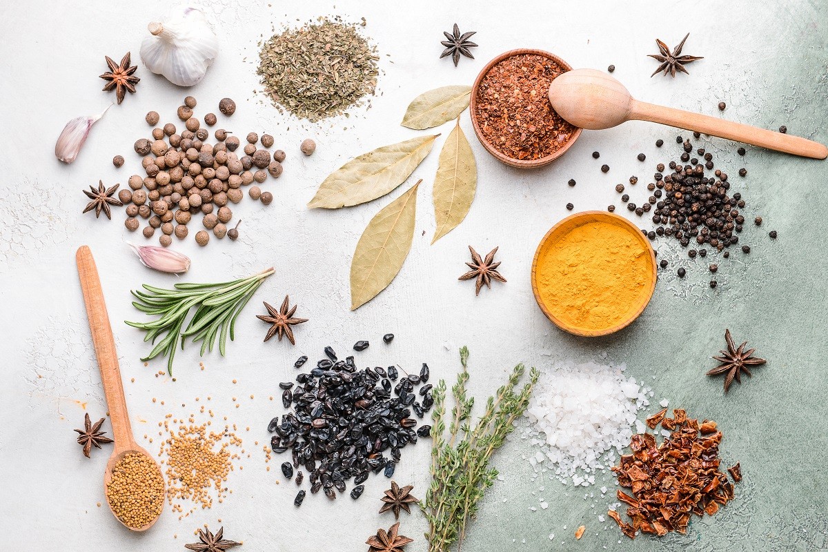 Different spices on light background