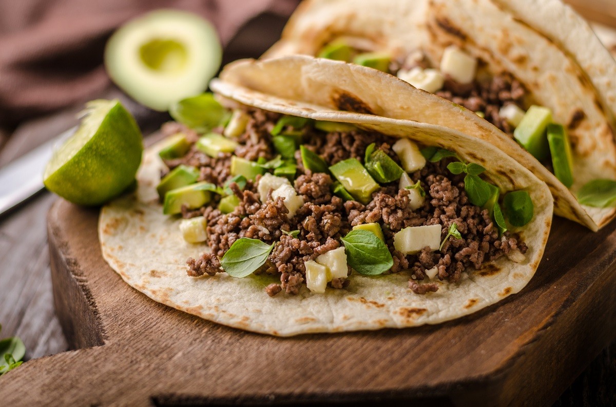 Homemade minced beef tortilla, fresh avocado and mozarella cheese