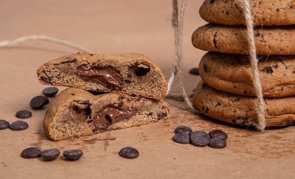 Classic chip cookie filled with Nutella. Isolated image