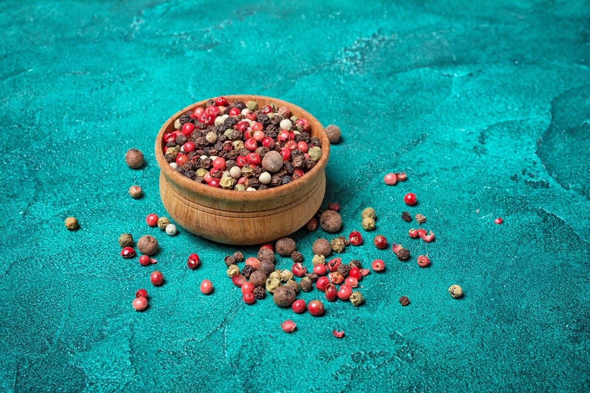 Mixed of peppers in wooden bowl
