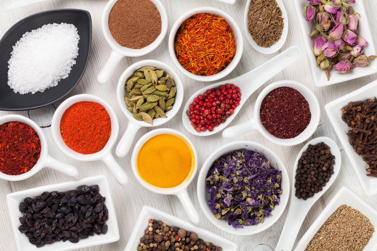 Various spices on wooden background