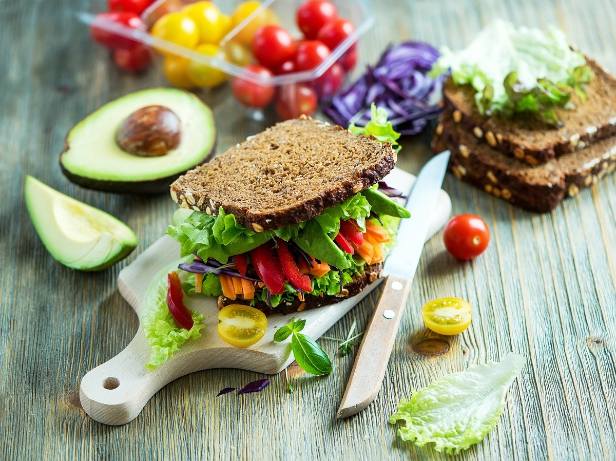 Vegan rye wholegrain fresh sandwich with ingredients for healthy