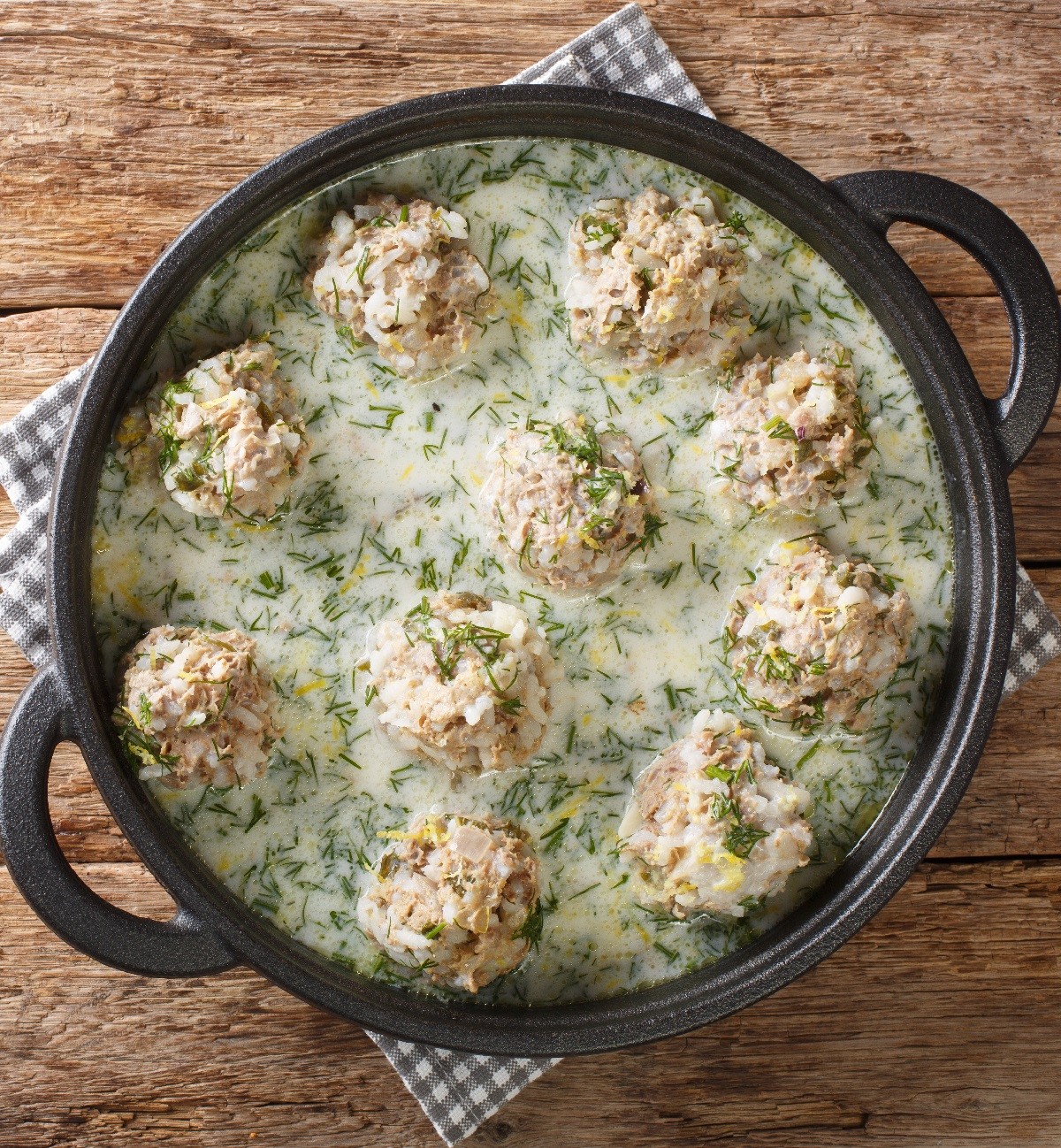 ?eatballs with rice in yogurt sauce Yuvarlakia close-up in a pla