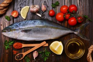 Fish yellowtail (Japanese amberjack) pices and vegetables