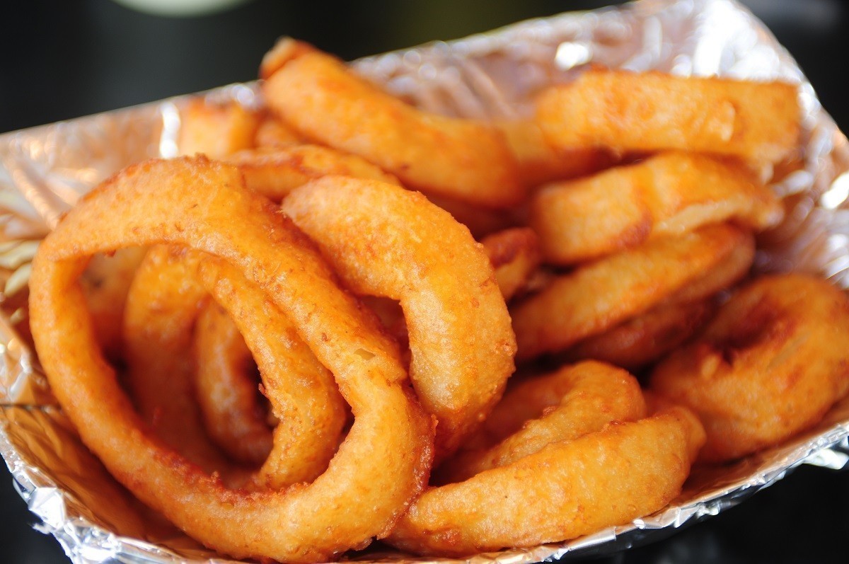 Golden onion rings and ketchup