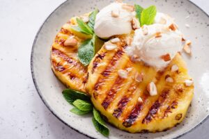 Grilled pineapple with ice cream