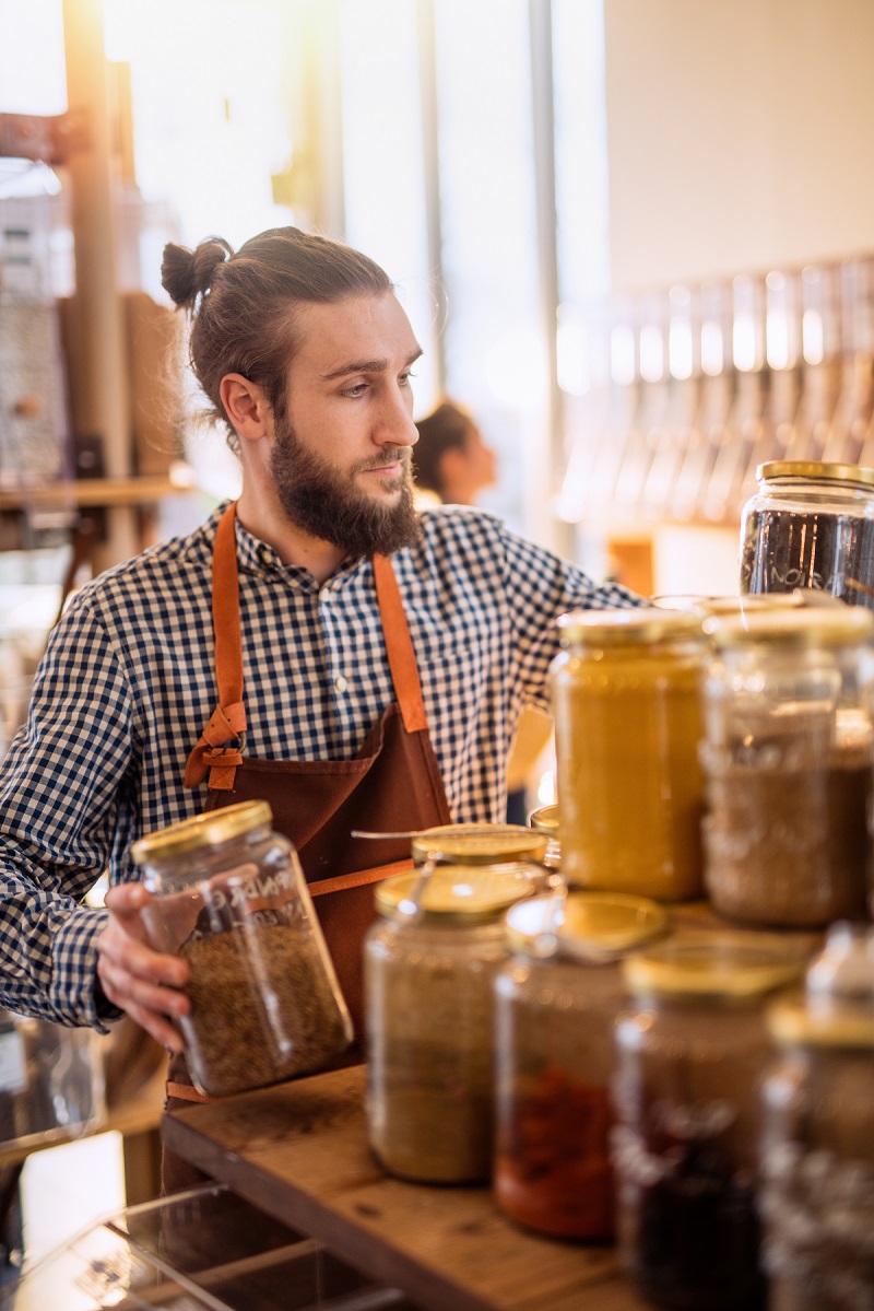 A  salesman in a bulk food store