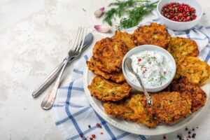 Zucchini pancakes and yogurt sauce for breakfast.