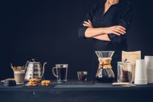Professional barista preparing coffee alternative method
