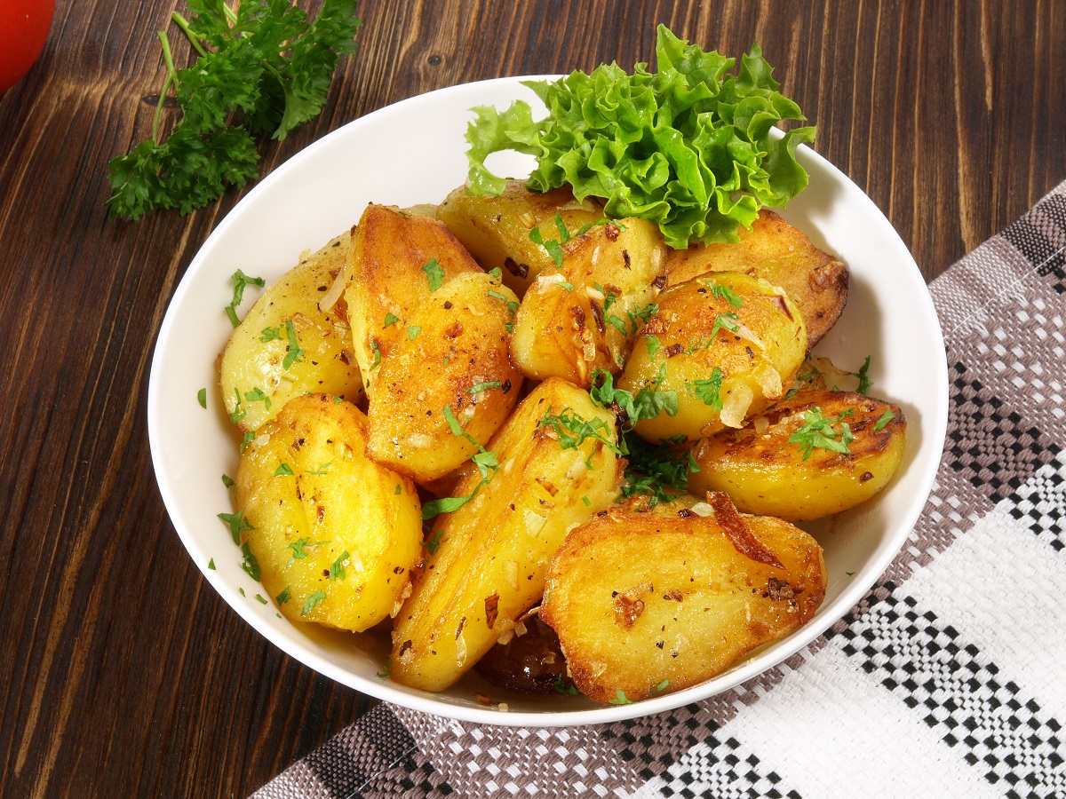 Classic Roasted Potatoes with Bacon and Onions in a Bowl