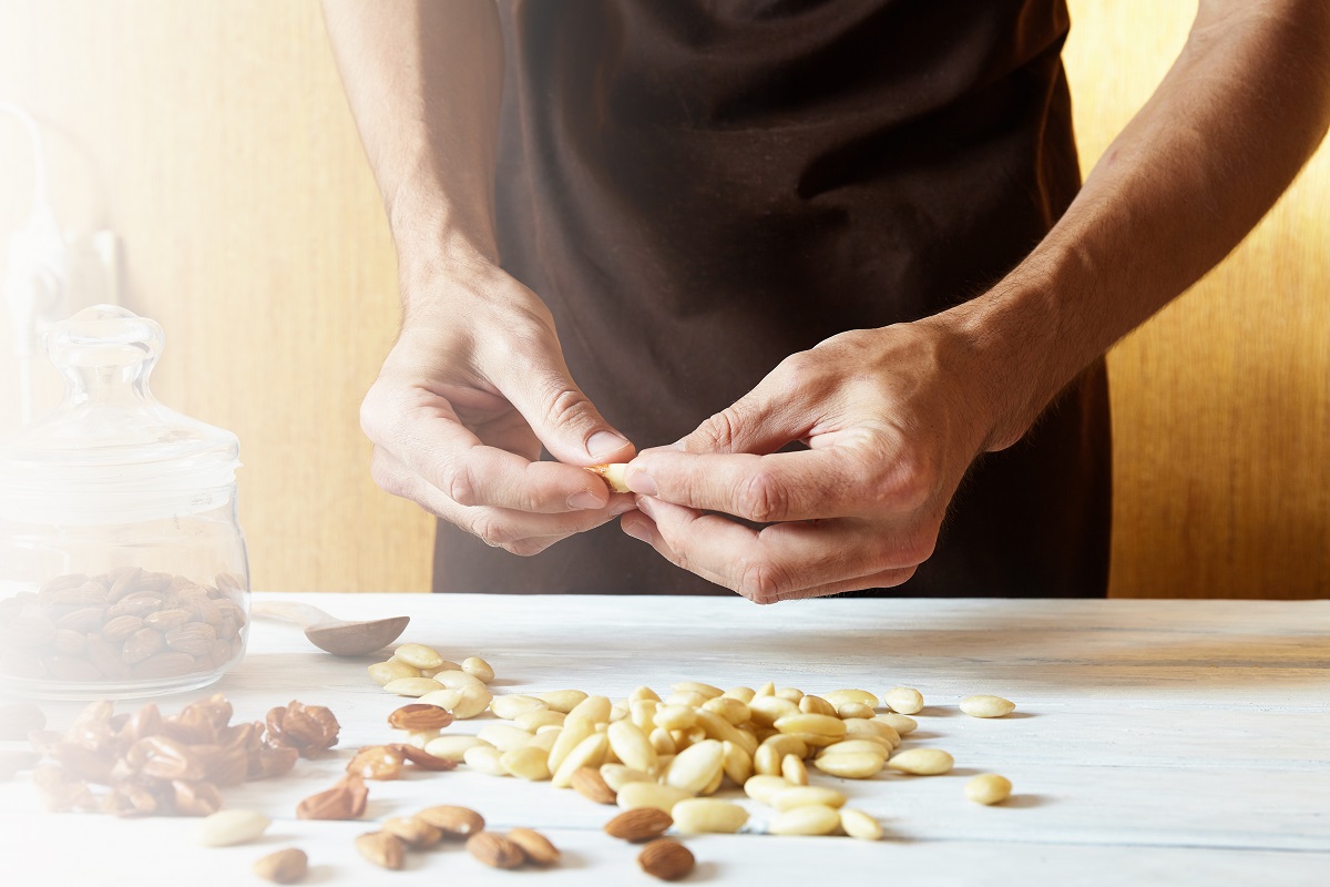 peeled almonds on the table.