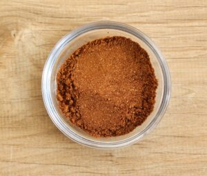 Glass,Bowl,With,Dutch,Speculaas,Spice,Powder,On,Wooden,Background