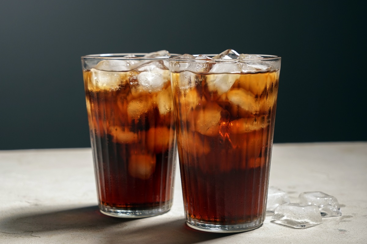 Glasses,Of,Tasty,Soda,With,Ice,On,Table