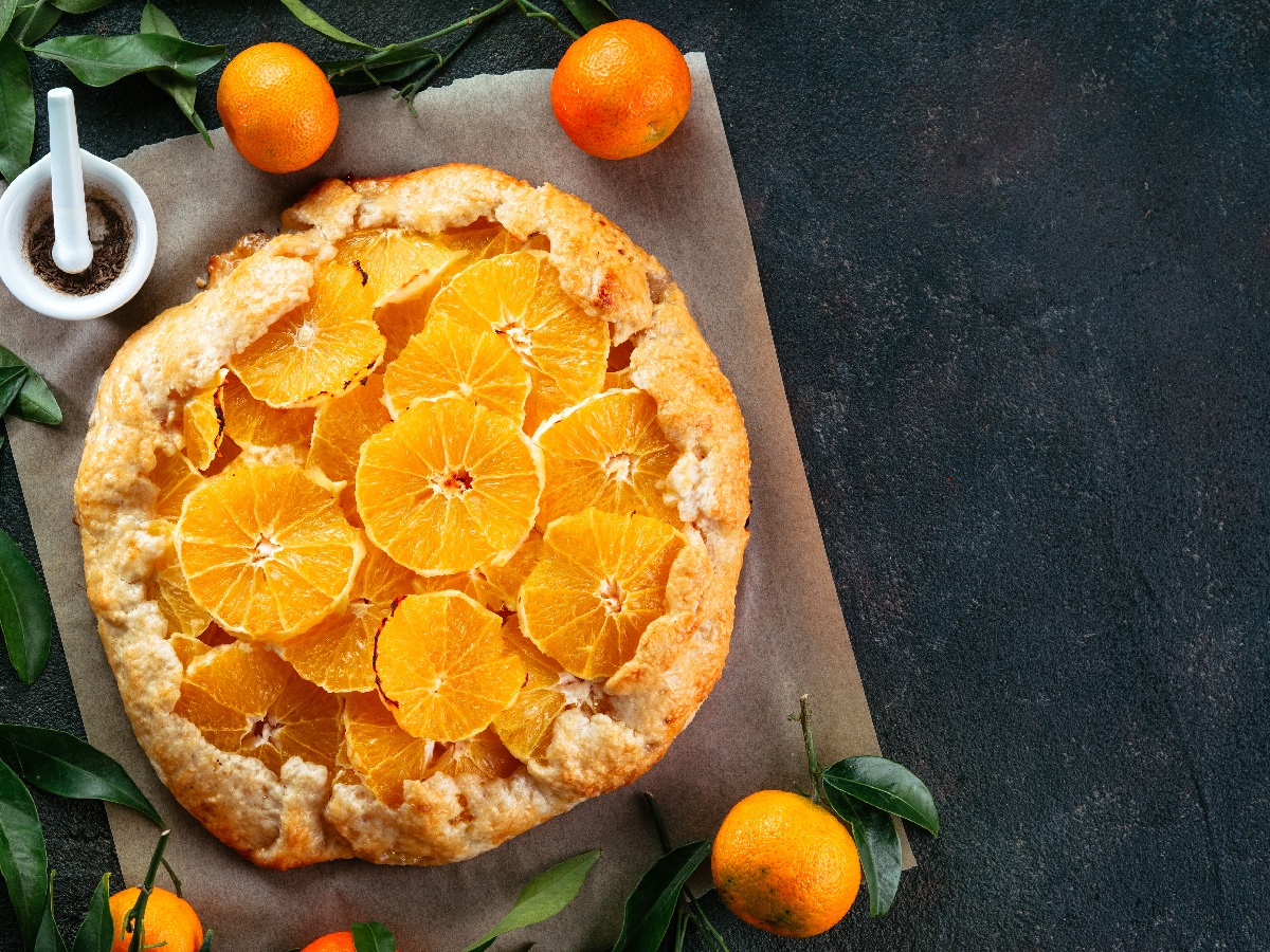 Top,View,Of,Caraway,And,Orange,Tart,On,Baking,Paper