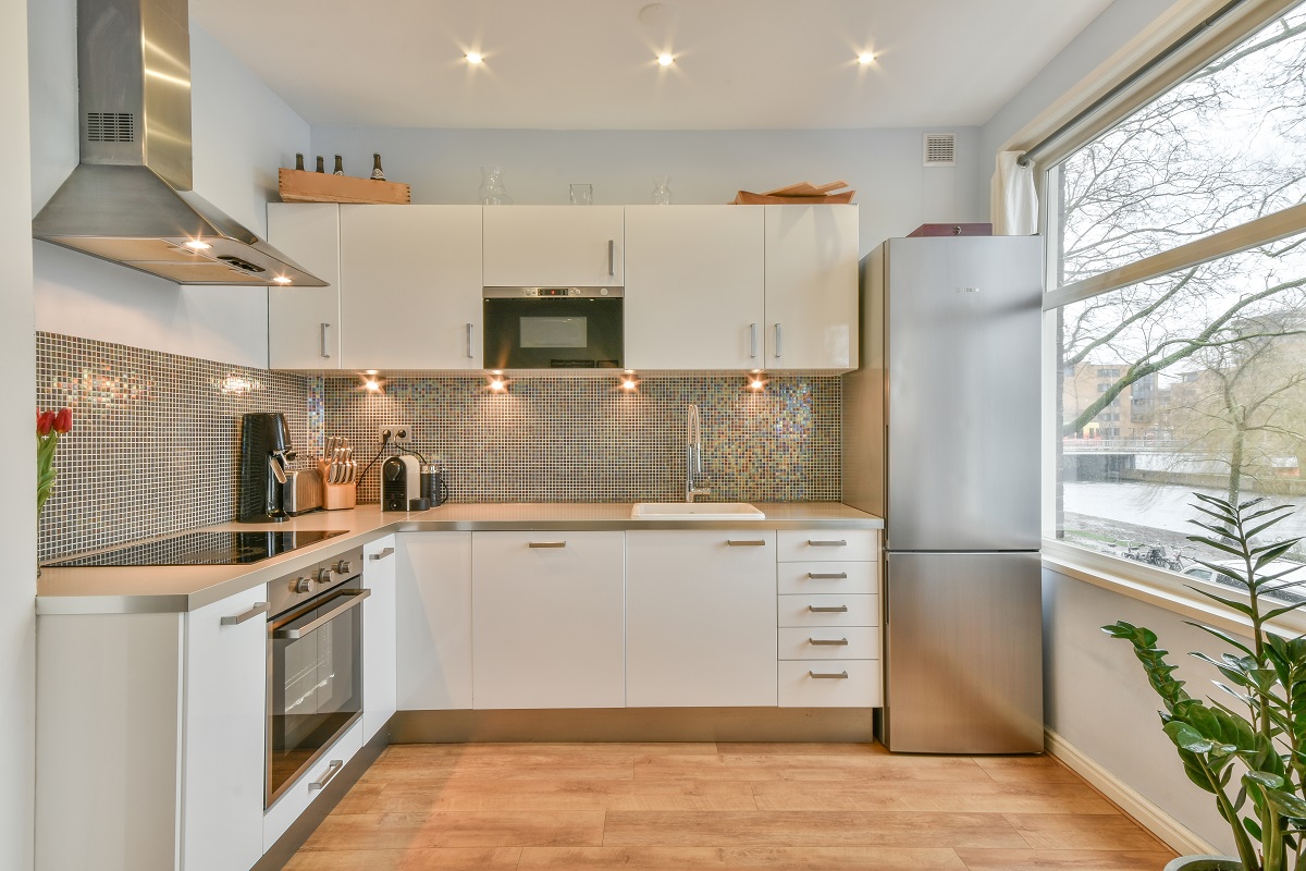 Couches,And,Table,Located,Near,Tv,Against,Dining,Area,Of