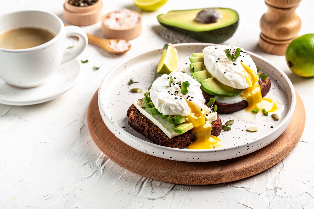 Sandwich,With,Avocado,And,Poached,Egg.,Wholemeal,Bread,Toast,Sliced