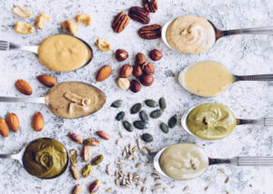 Nuts,And,Seeds,Butter,On,A,Spoons,With,Ingredients.,Homemade