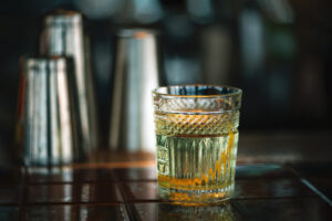 White,Negroni,Cocktail,On,The,Bar,Counter.,Close-up.