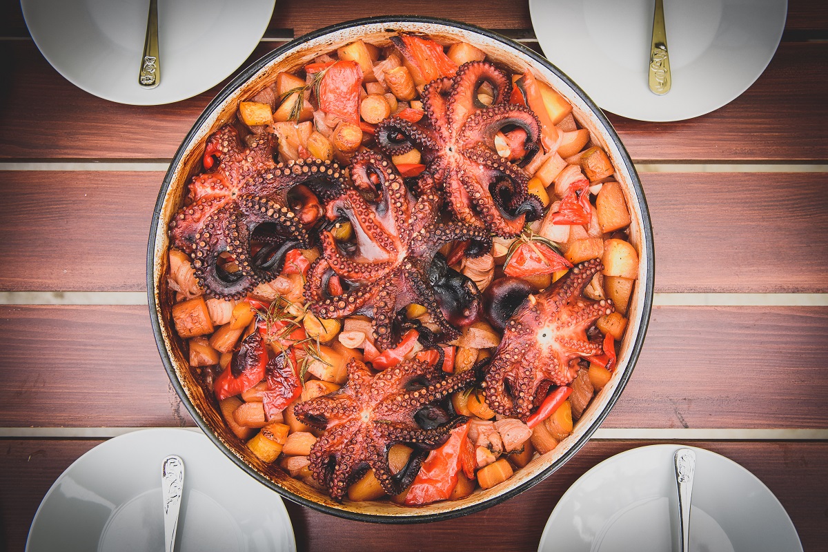 Preparing,And,Cooking,Of,Octopus,In,Traditional,Balkan,Croatian,Greek