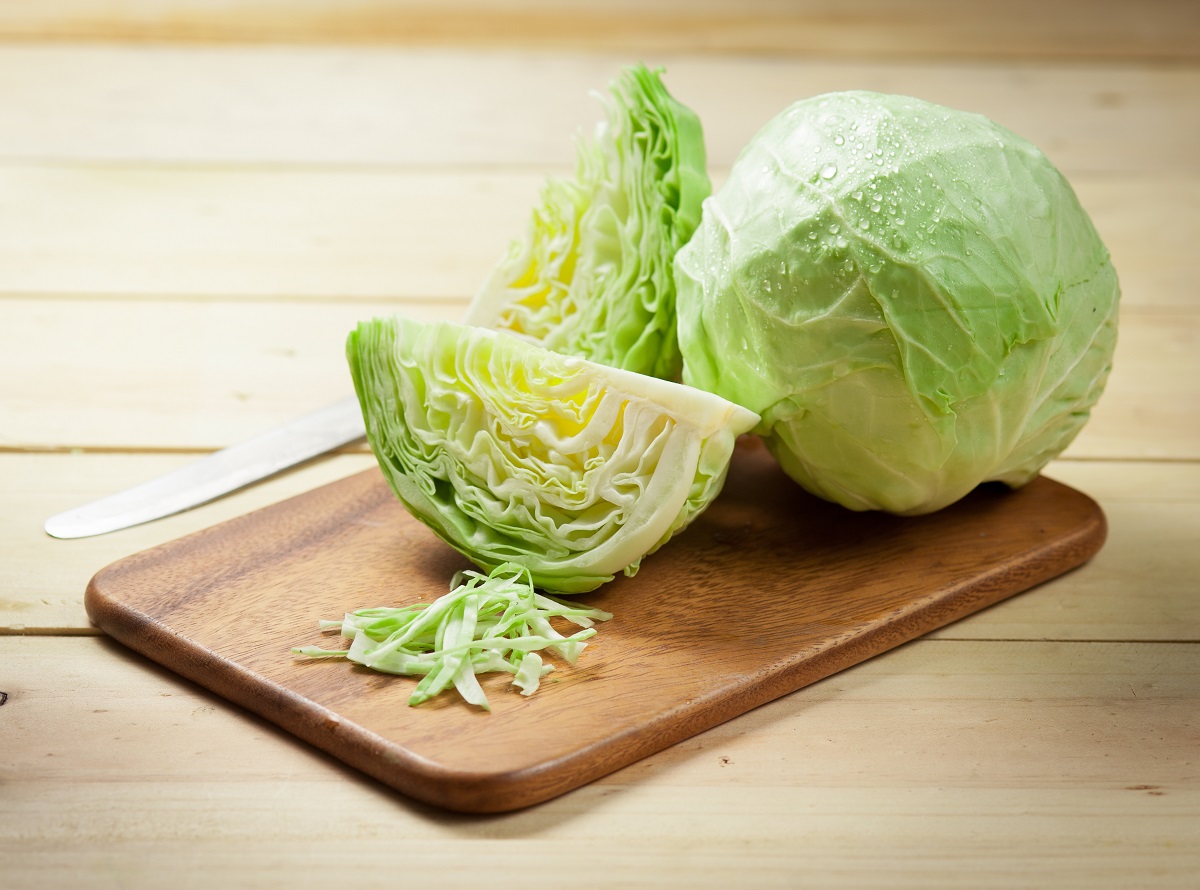Cabbage,And,Cutted,Cabbage,On,Wooden