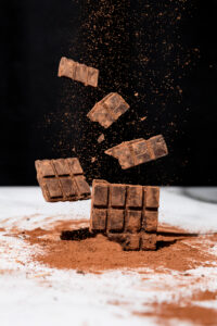 Milk,Chocolate,Bar,Pieces,With,Cocoa,Powder,Around.,Design,Template