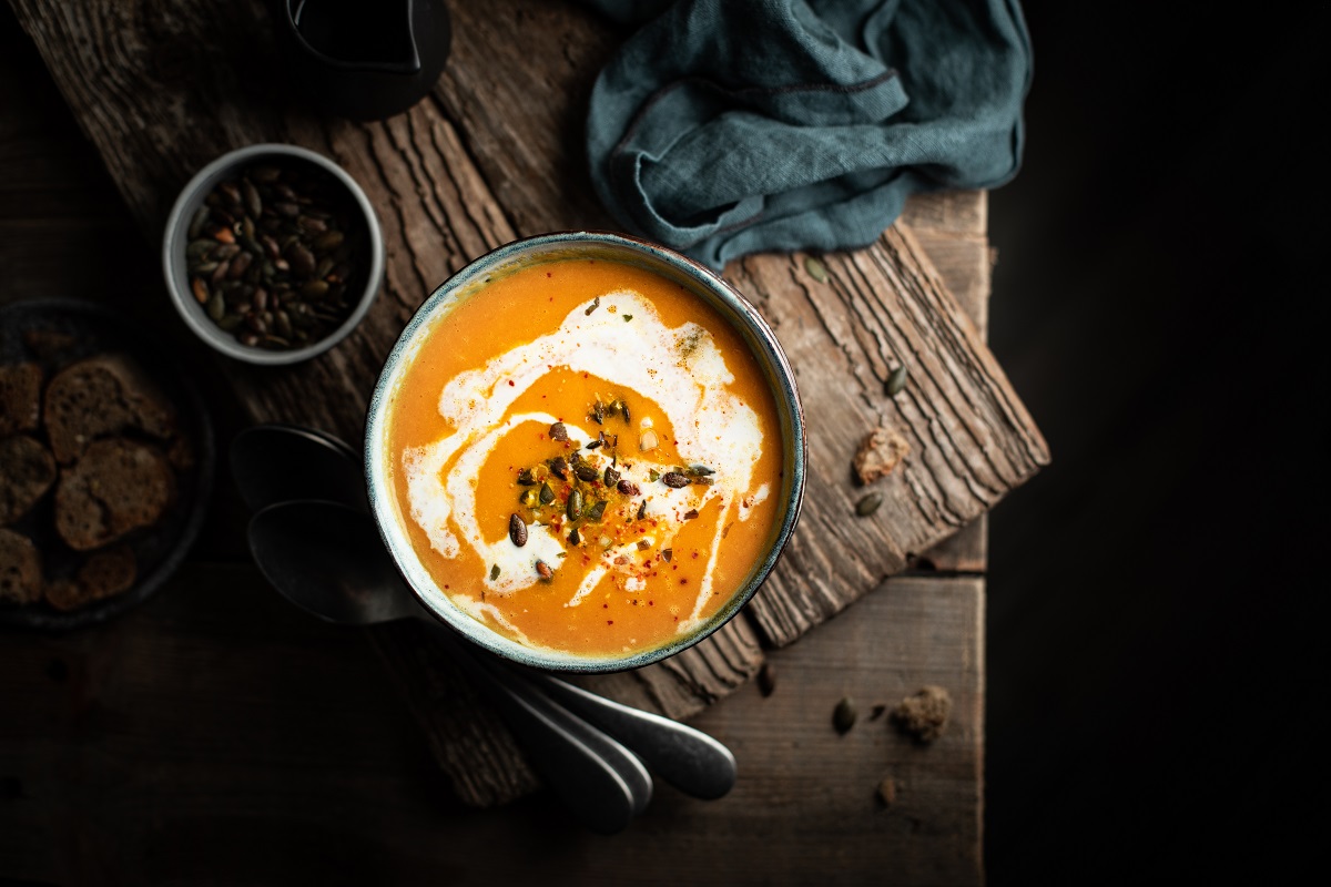 Pumpkin,Soup,Veloute,With,Coocnut,Cream,And,Seeds
