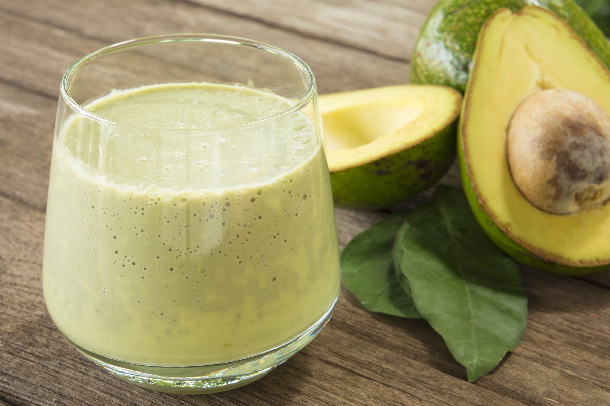 Avocado,Smoothie,On,A,Wooden,Table,With,Dark,Wood,Background.