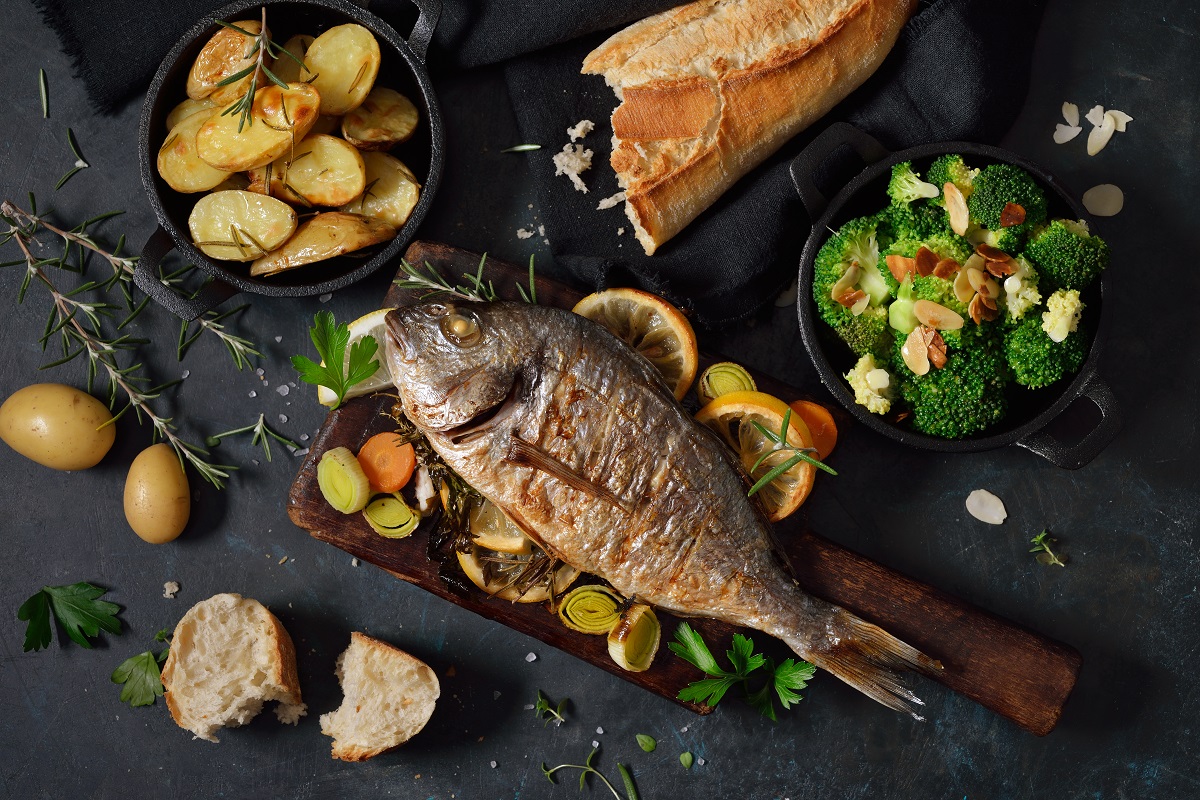 Oven,Fresh,Gilthead,Baked,With,Herbs,And,Lemon,,Served,With