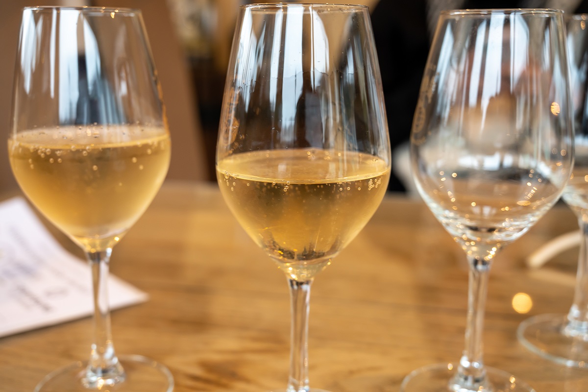 Tasting,Glass,With,Cold,Brut,Champagne,Sparkling,Wine,In,Cellars