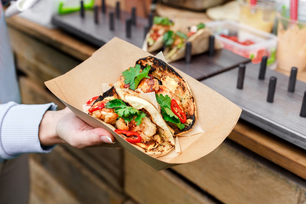 Female,Street,Vendor,Hands,Show,Fresh,Roasted,Meat,And,Vegetables